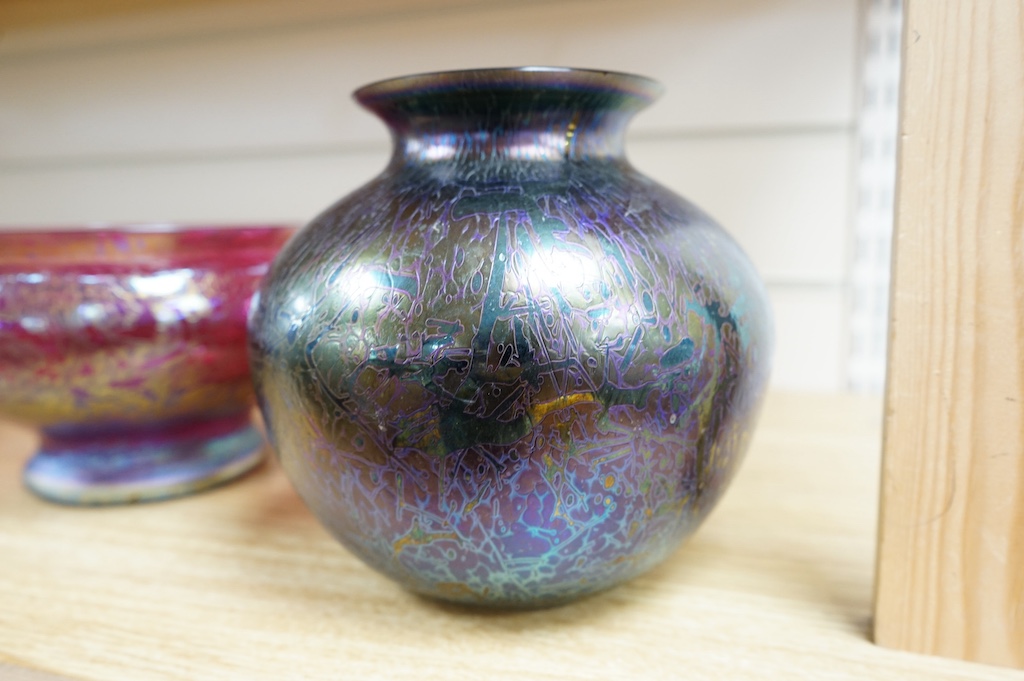 An iridescent art glass pedestal bowl and similar vase, bowl 20cm diameter. Condition - good